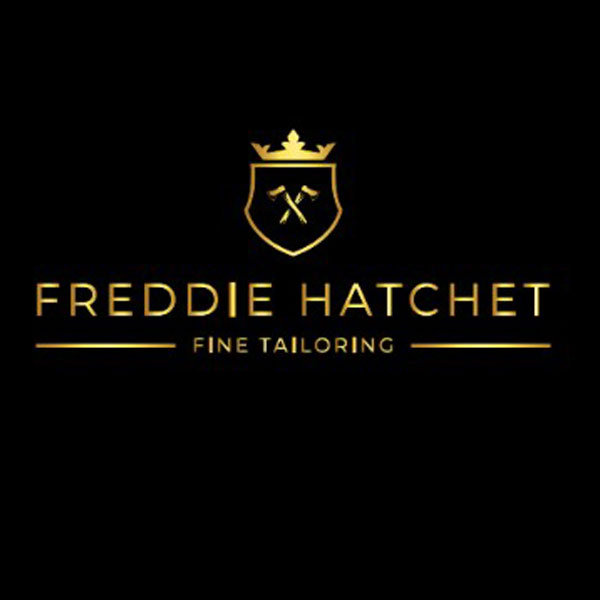 Freddie Hatchet logo featuring gold crest and crossed hatchets, promoting fine tailoring.