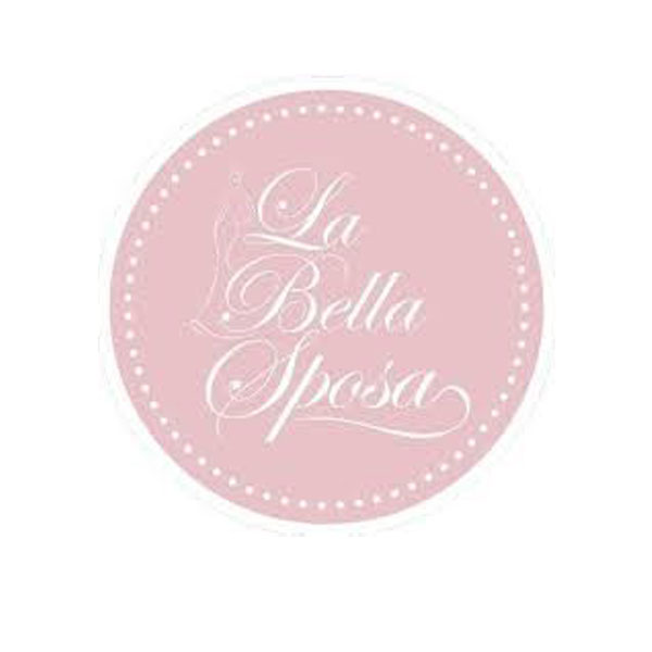 La Bella Sposa logo in elegant script on a pink circular background with decorative white dots.