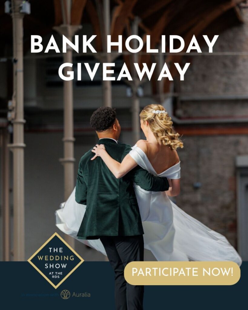 Couple dancing at The Wedding Show event, showcasing Bank Holiday Giveaway. Participate now!